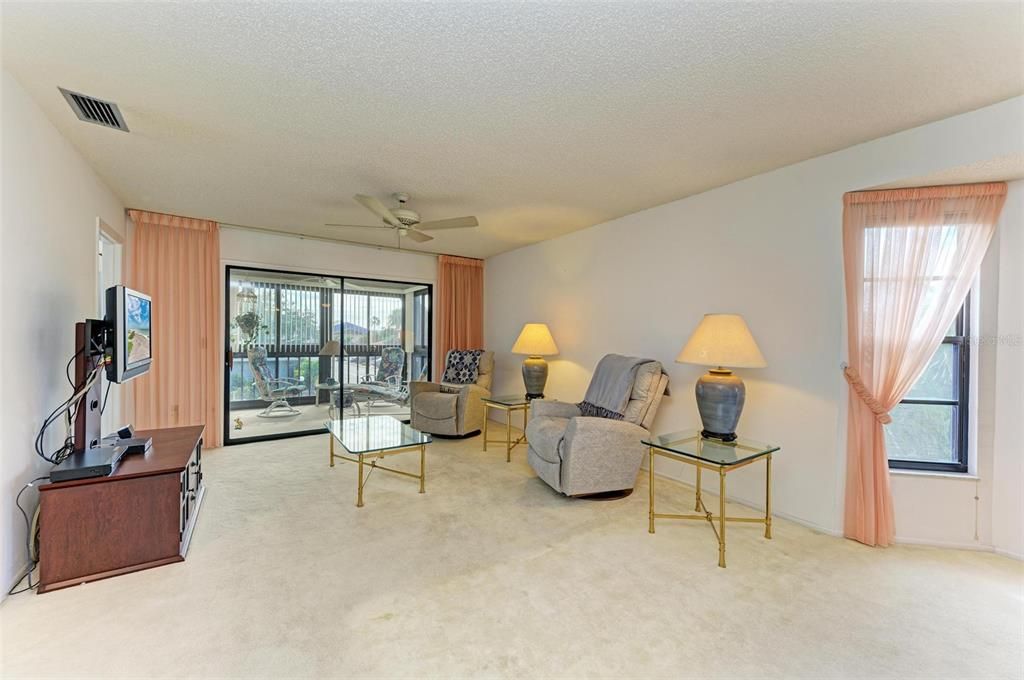 Spacious living room that leads out to the lanai/balcony