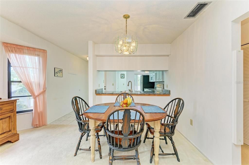 Generous dining area looking into the kitchen