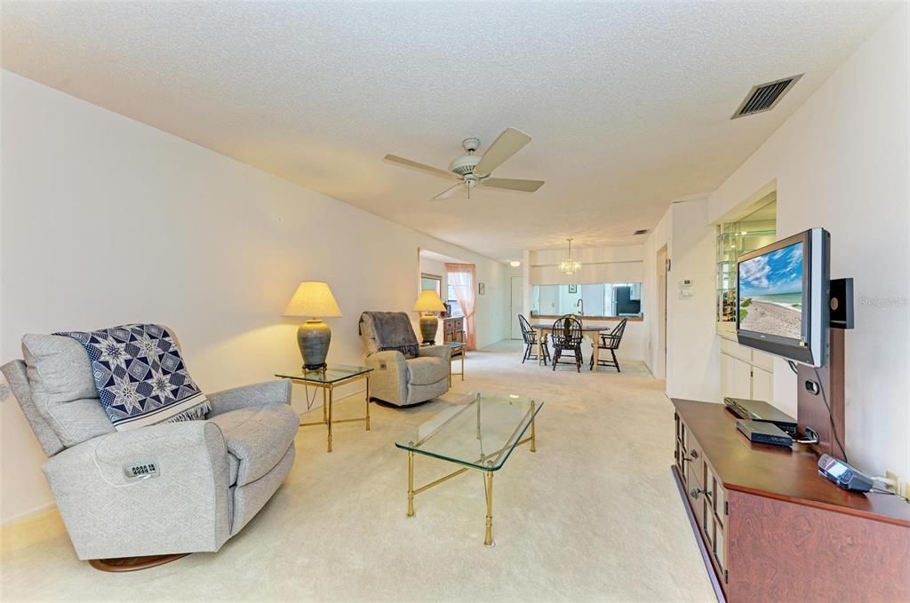 Spacious living room that leads out to the lanai/balcony