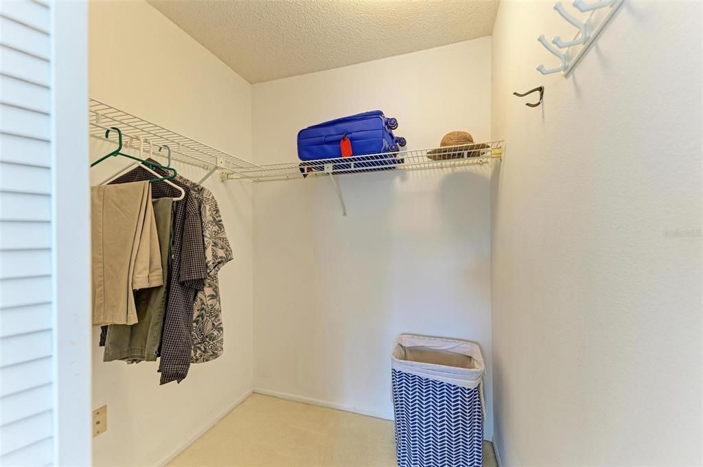 Walk-in closet in primary bedroom