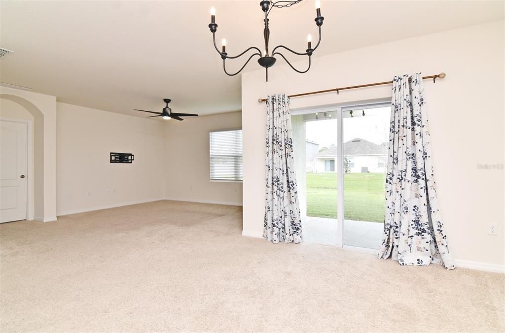 View of kitchen and dining from living room. Nice and open