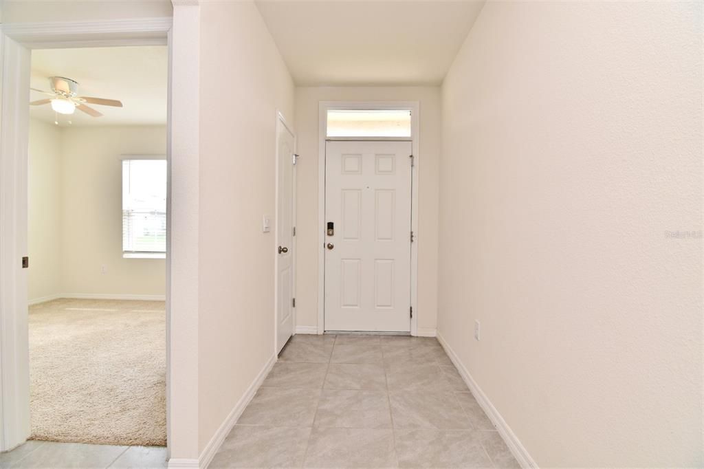 Foyer with a hall closet