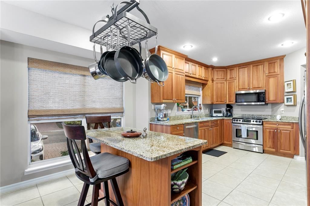 Nicely sized kitchen with loads of cabinetry and a nicely proportioned island for extra prep space