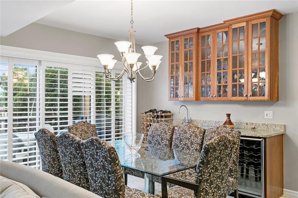 Dining room with wet bar space makes gatherings easy