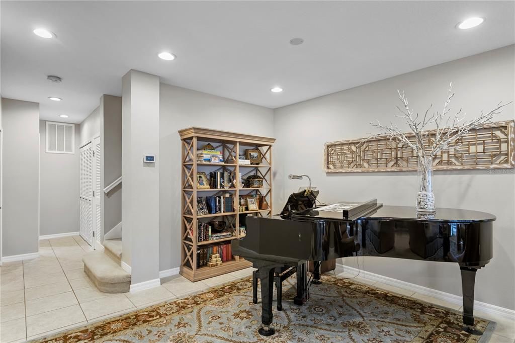 A perfect place for the grand piano or a separate space for a reading nook.