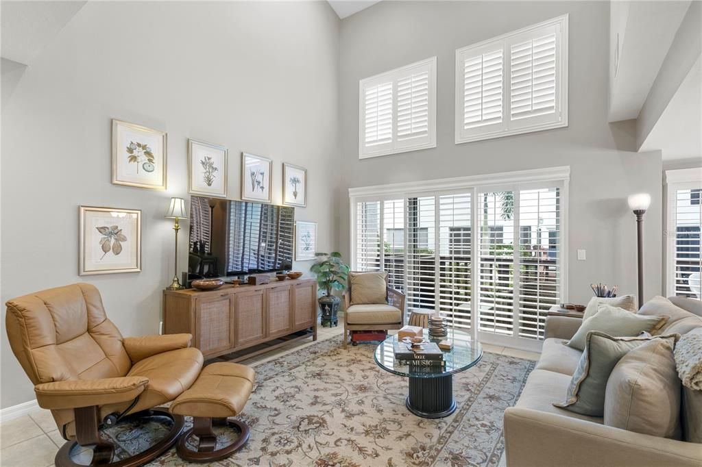 Loads of natural light fill this space; notice the vaulted/cathedral ceilings.