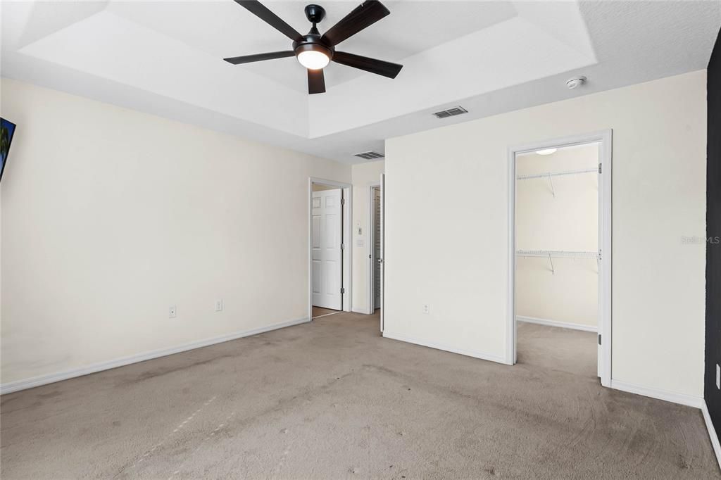 Master bedroom showing master closet