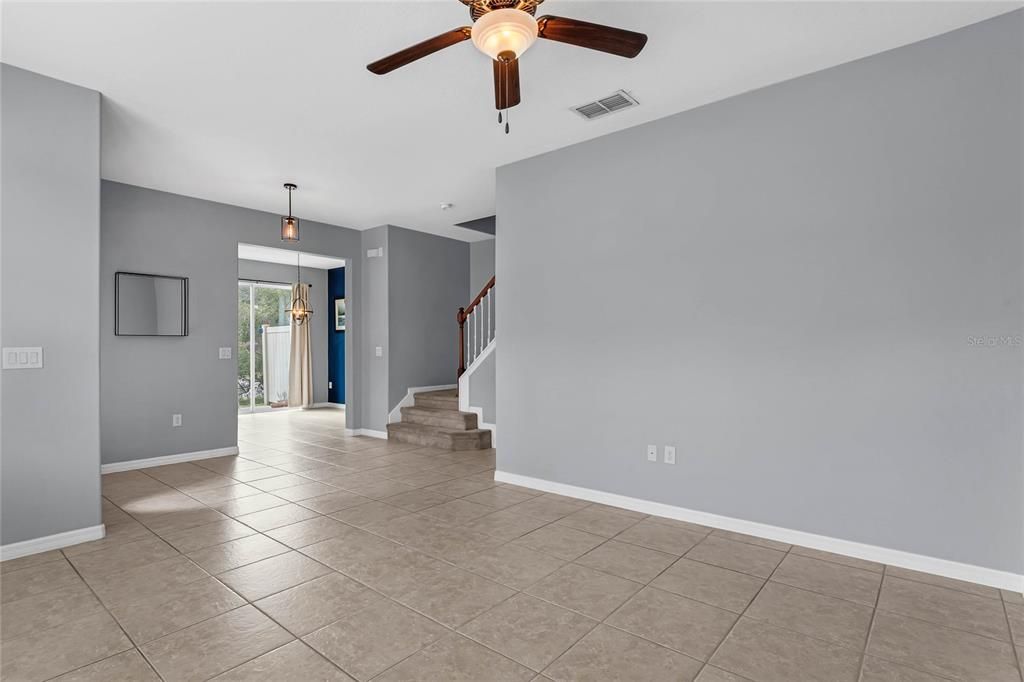 Living space showing entrance into dining area