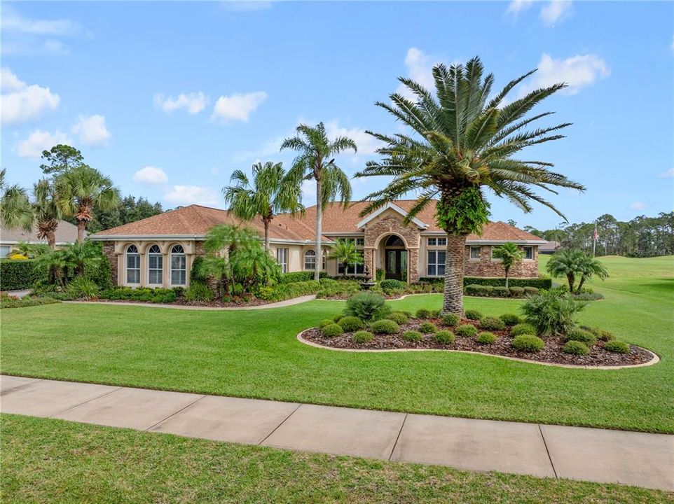 Lush, Tropical Landscaping Surrounds Property