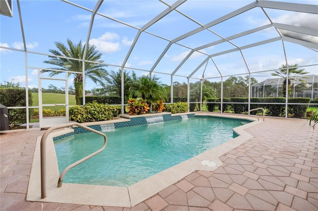 Pool with Waterfall Features & Landscaping