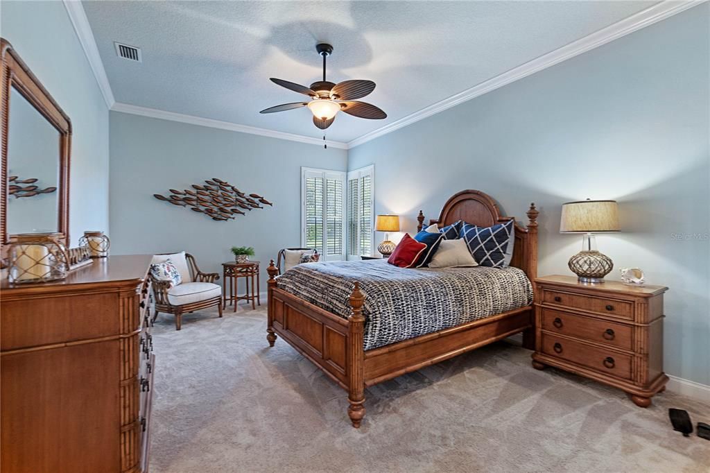 Bedroom 2 w/Crown Molding & Window w/Plantation Shutters