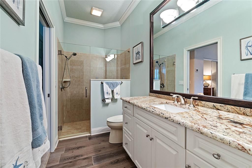 Ensuite Bathroom w/Walk-in Tile Shower & Granite Vanity Sink