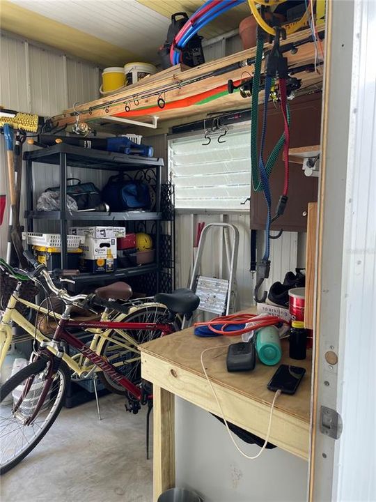 Workbench and storage in shed.