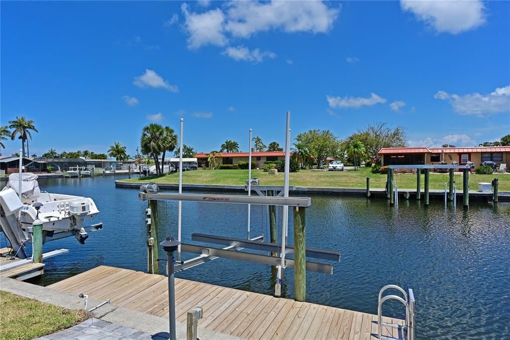 Dock and 7,000 lb lift in back yard