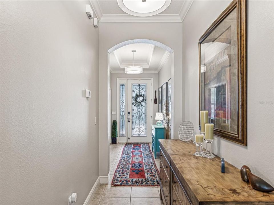 The 10-foot long hallway allows the transition to unfold from the entry to the warmth of the kitchen/family room.