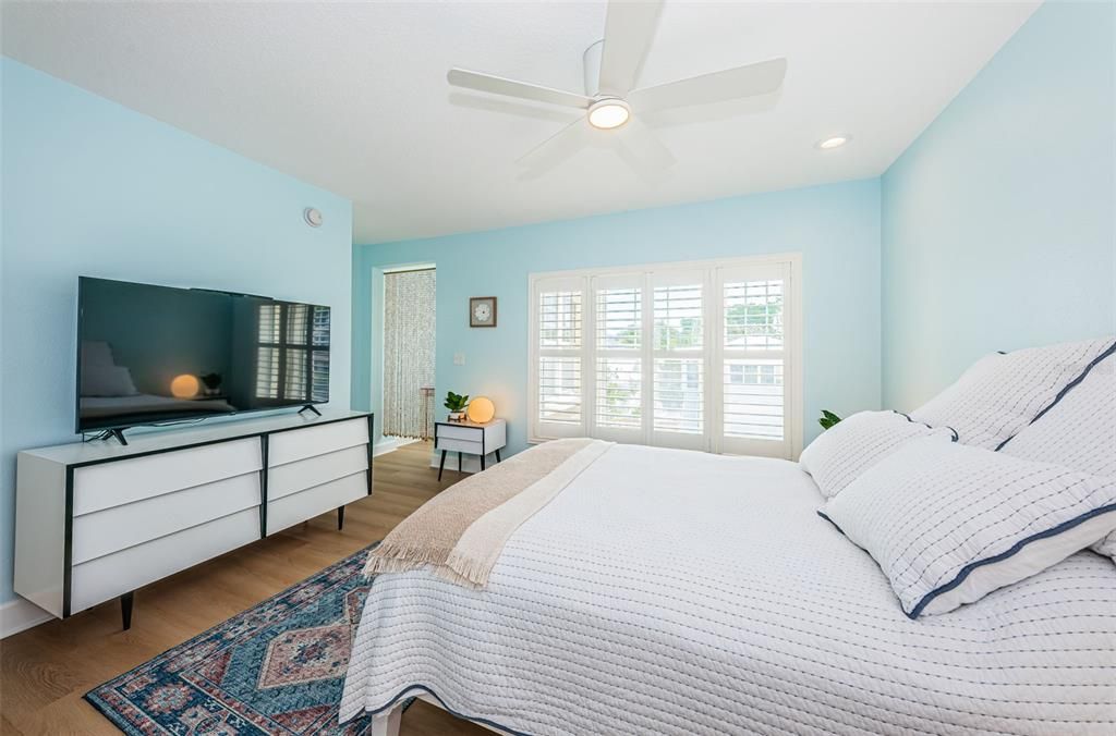 Travel upstairs to two large bedrooms. This room features two closets and an office nook.