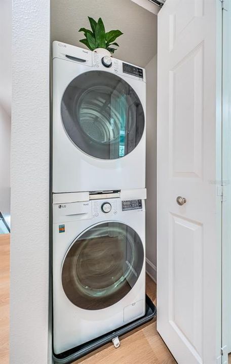 Washer and dryer is located upstairs between the two bedrooms.