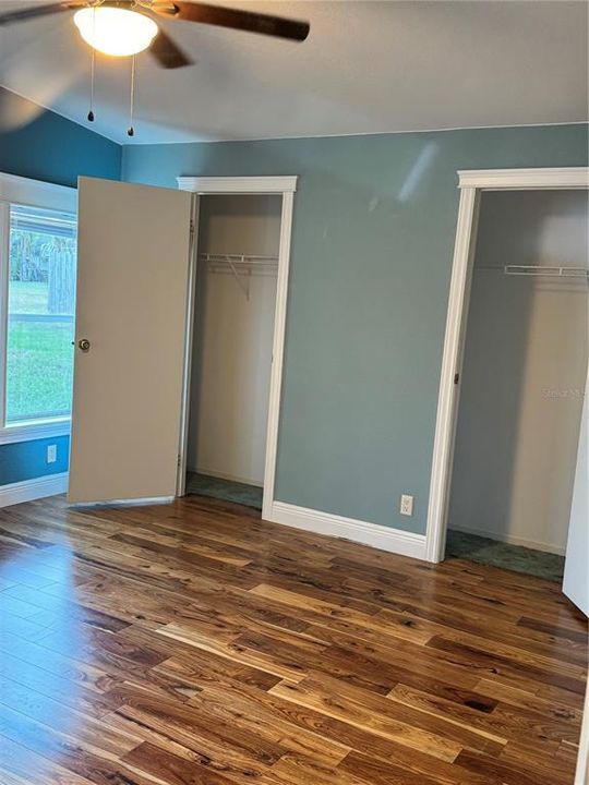 Primary Bedroom with dual closet entry