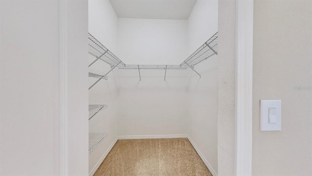 Walk In Closet in Primary, Additional Closet space acceoss the hallway