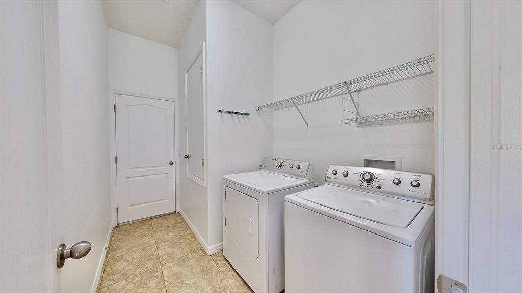 Laundry Space leading into Tandem Garage