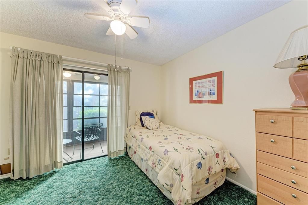 Guest Bedroom opens to Enclosed porch