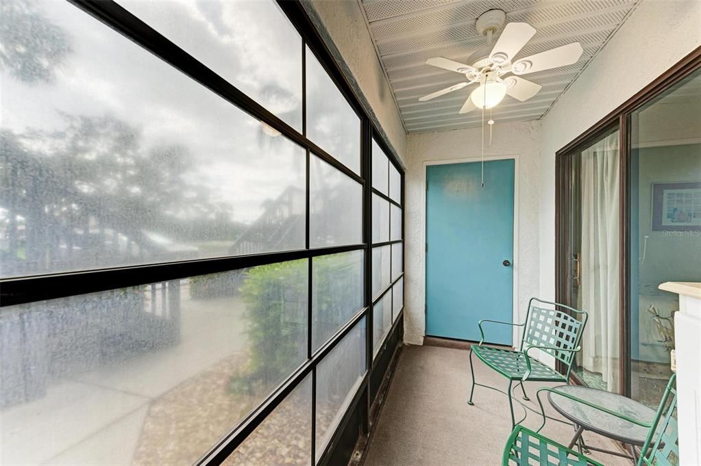 Storage room on the end of enclosed porch.