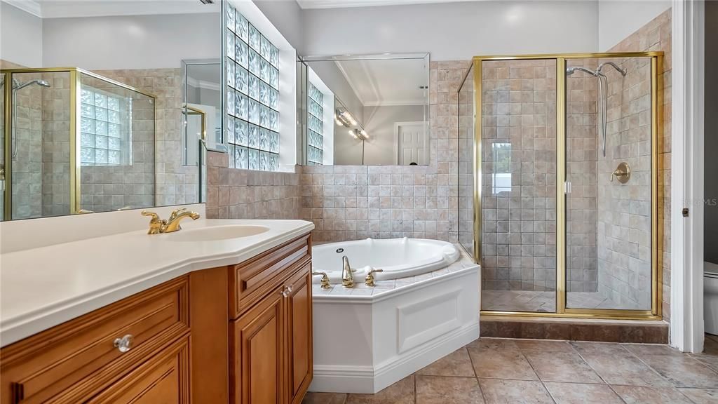 Primary Bathroom with soaking tub and separate shower.