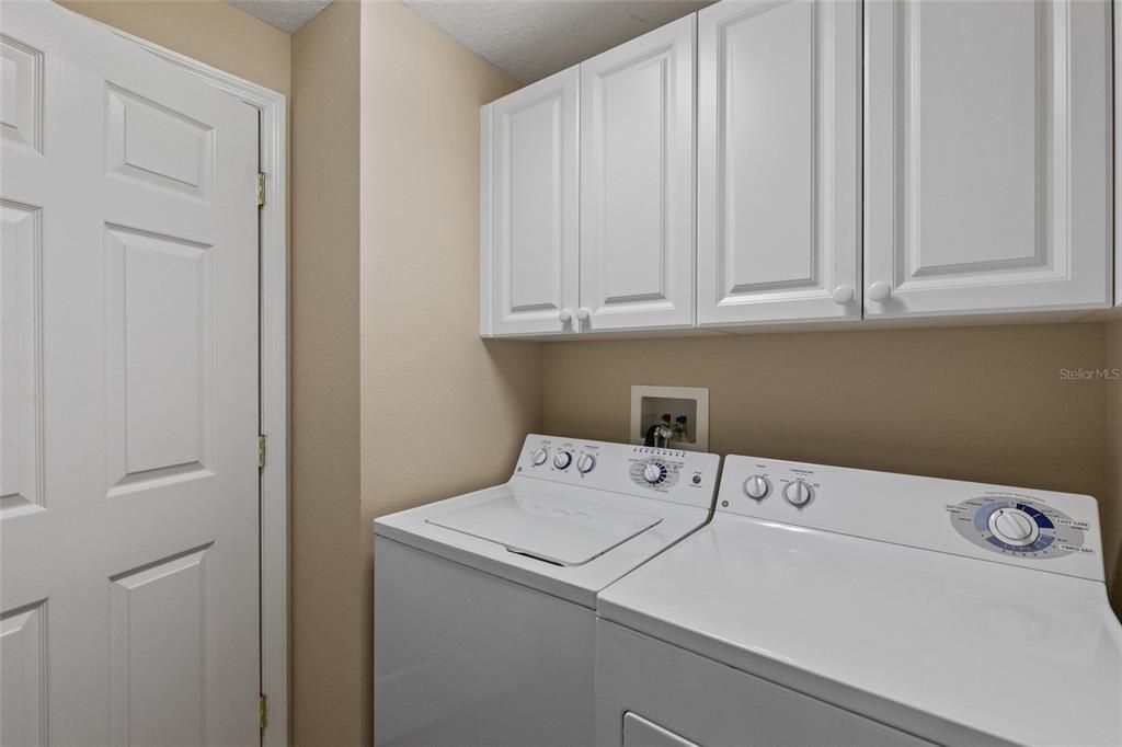 Laundry room that leads to the 2 car garage!