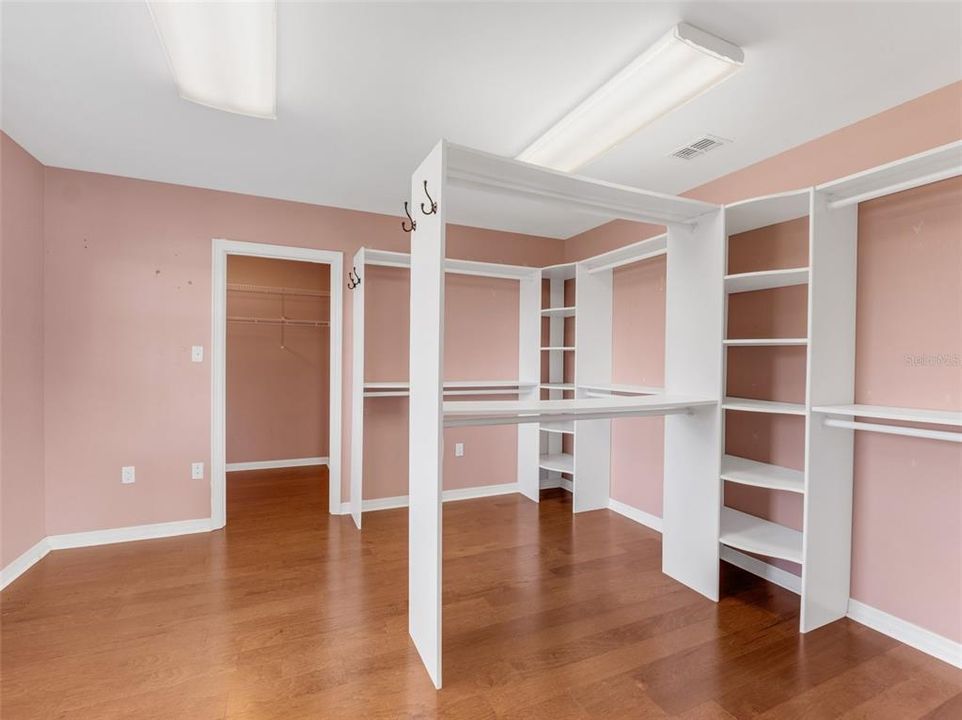 If this were not enough this primary suite also offers two room size walk-in closets.