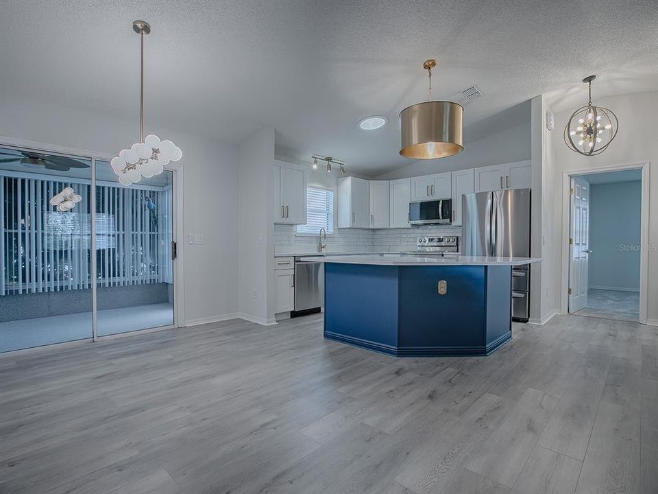 ENCLOSED LANAI OFF OF DINING ROOM!  LOVELY NEW UPGRADED KITCHEN.