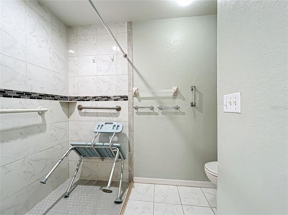 Nice walk-in shower fully tiled