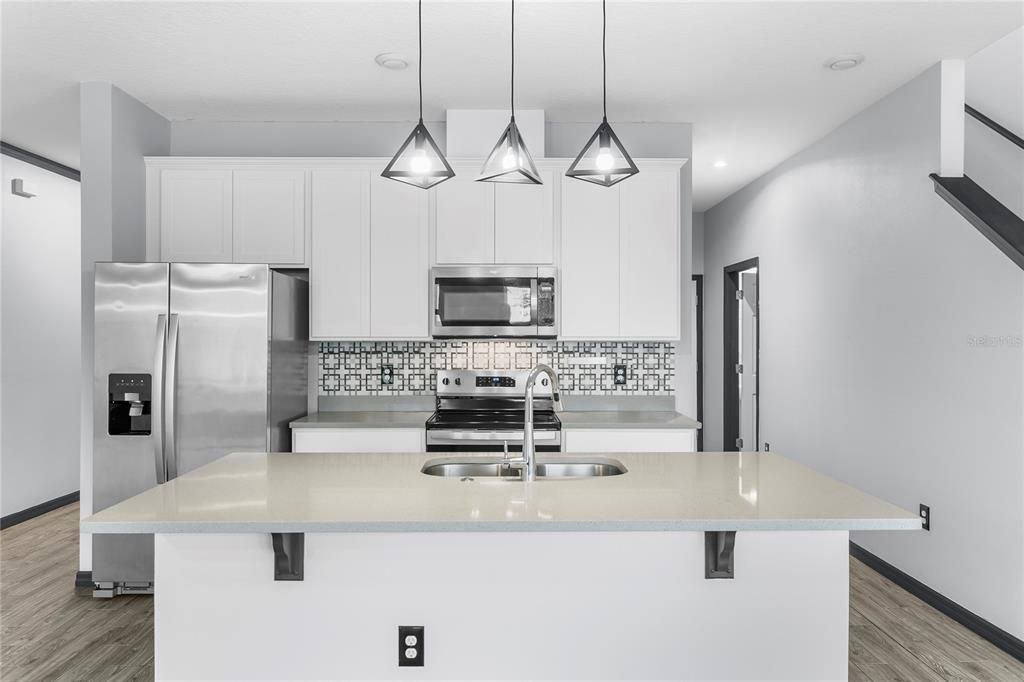 Kitchen with granite countertops 40inch cabinets and stainless steel appliances