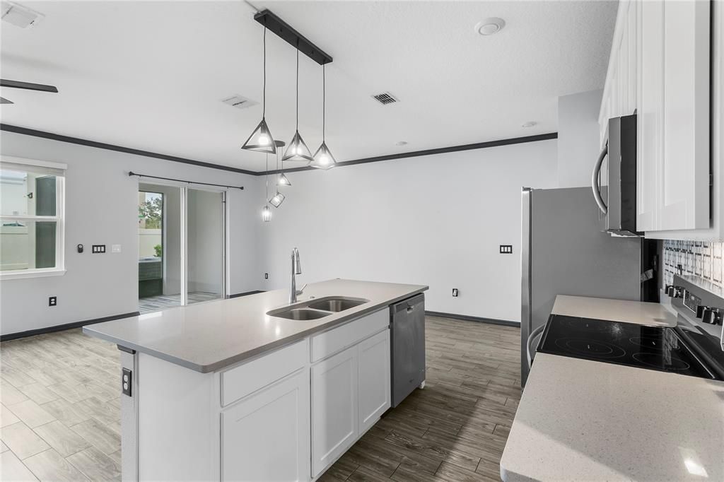 Kitchen with granite countertops 40inch cabinets and stainless steel appliances