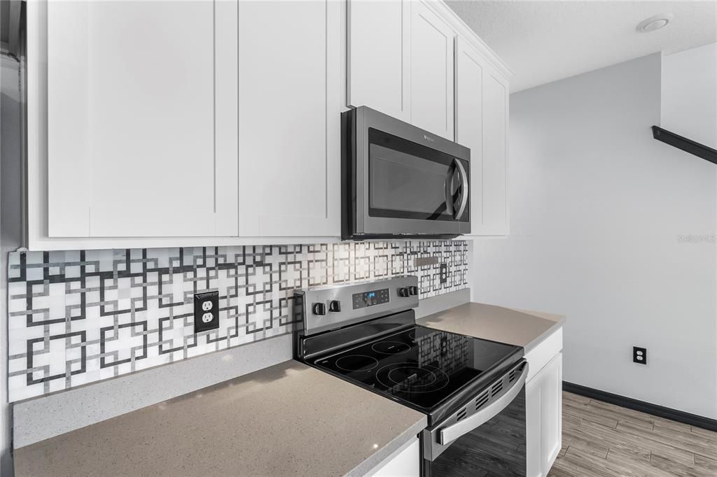 Kitchen with granite countertops 40inch cabinets and stainless steel appliances