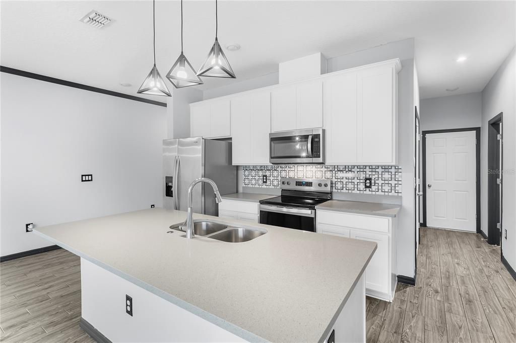 Kitchen with granite countertops 40inch cabinets and stainless steel appliances