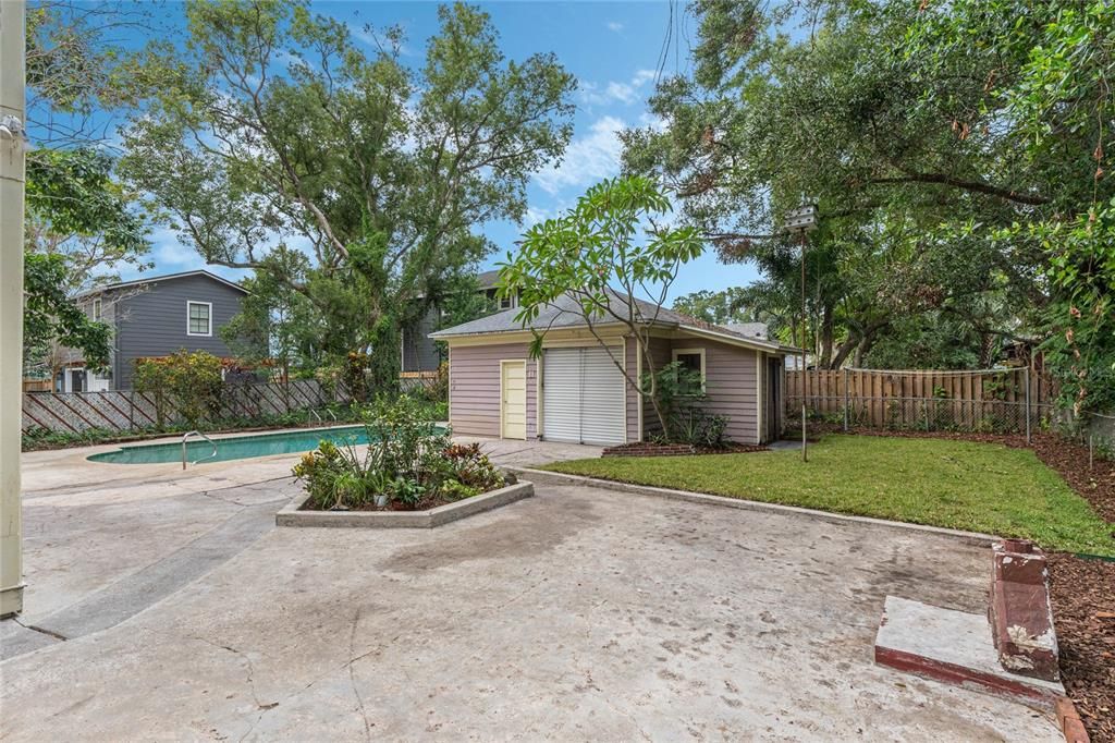 Back yard with garage and laundry room