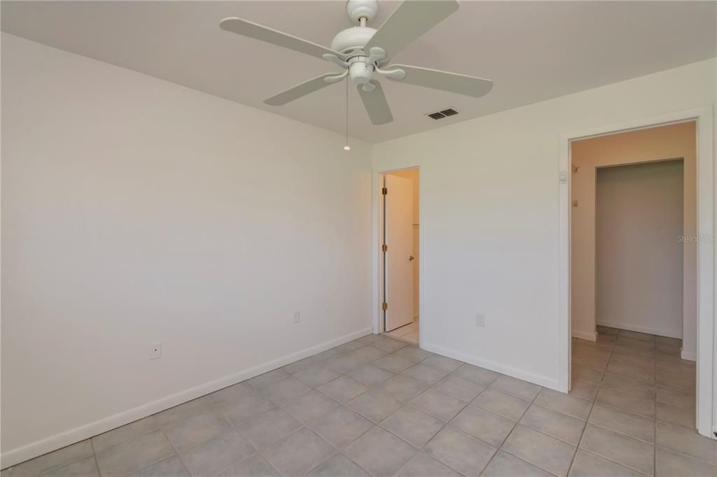 ensuite bath with walk in closet and full bath