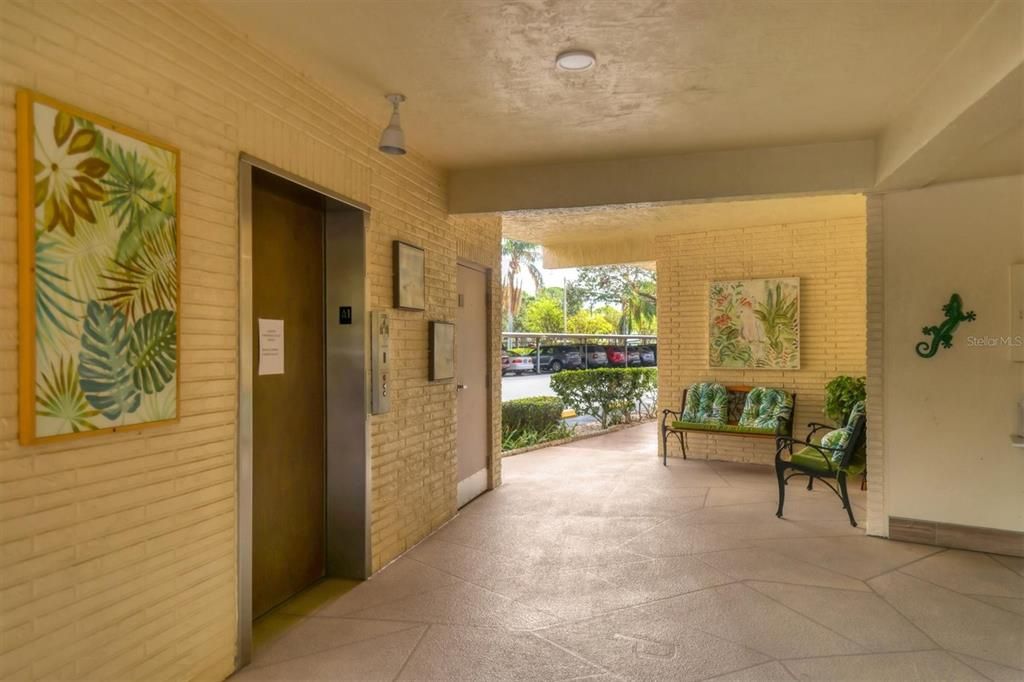 First floor lobby and elevator. Mailboxes located to the right (not shown).