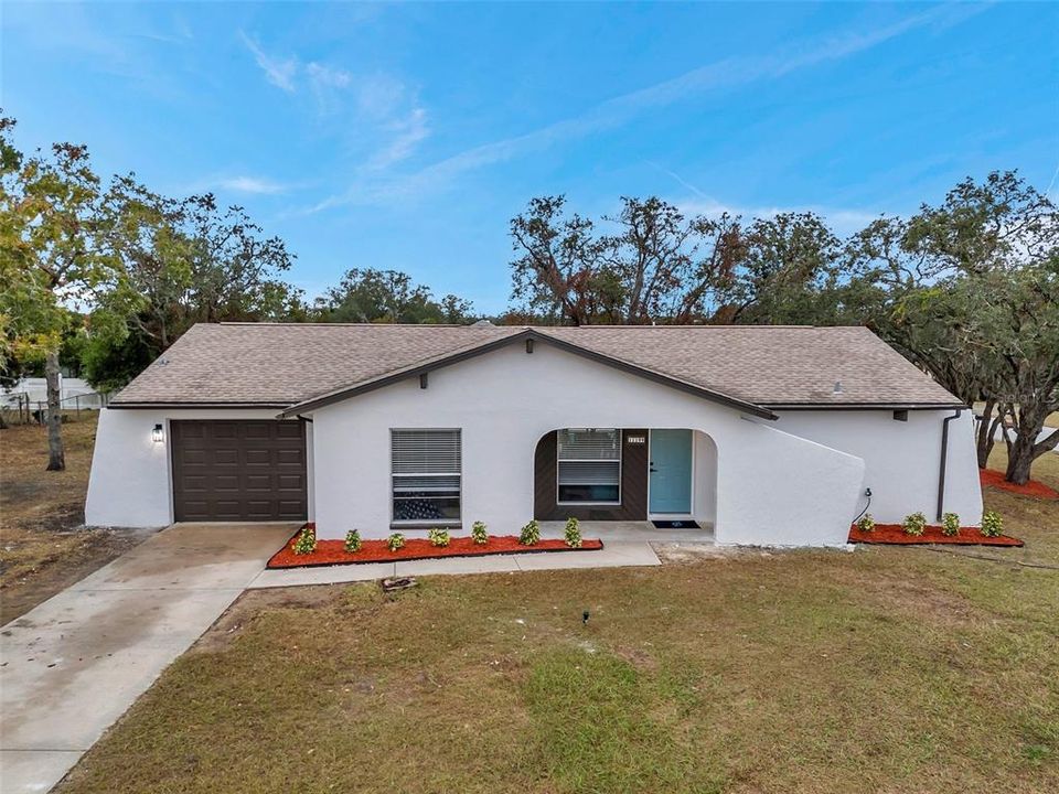 Charming Curb Appeal – Beautifully remodeled home on a spacious corner lot in Spring Hill.