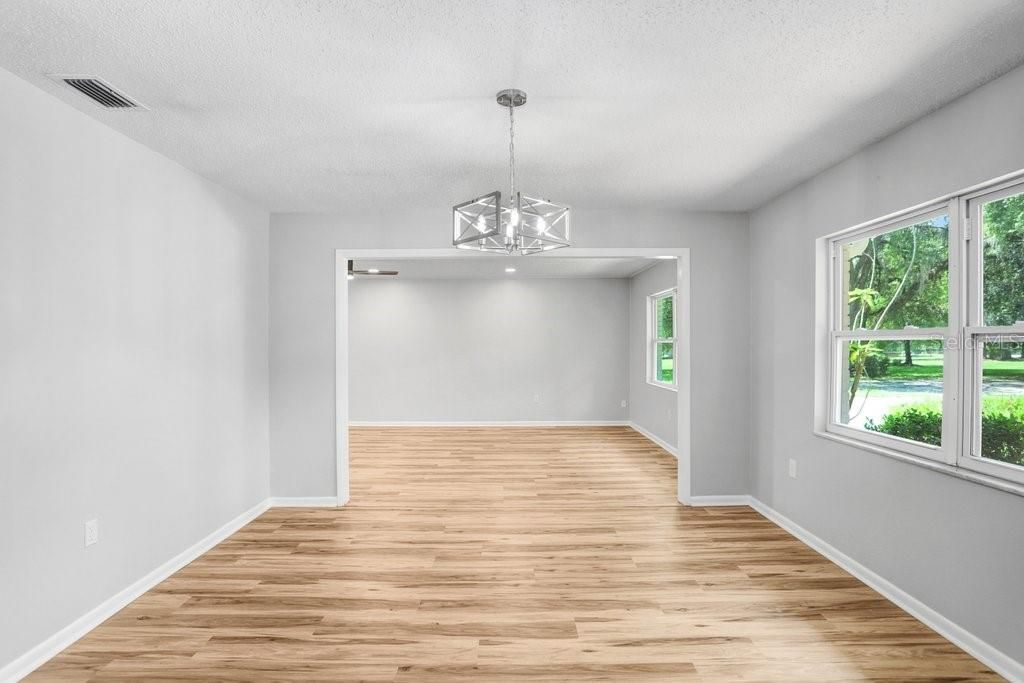 Dining room with access to Kitchen, Family Room & Living Room/Den