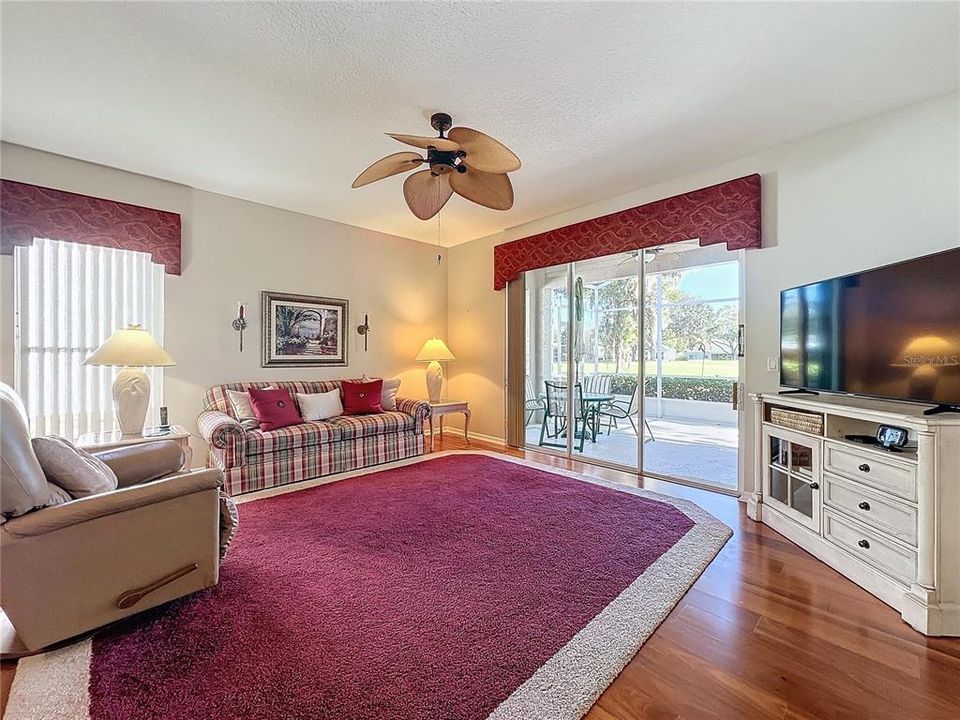 Family room has wood flooring