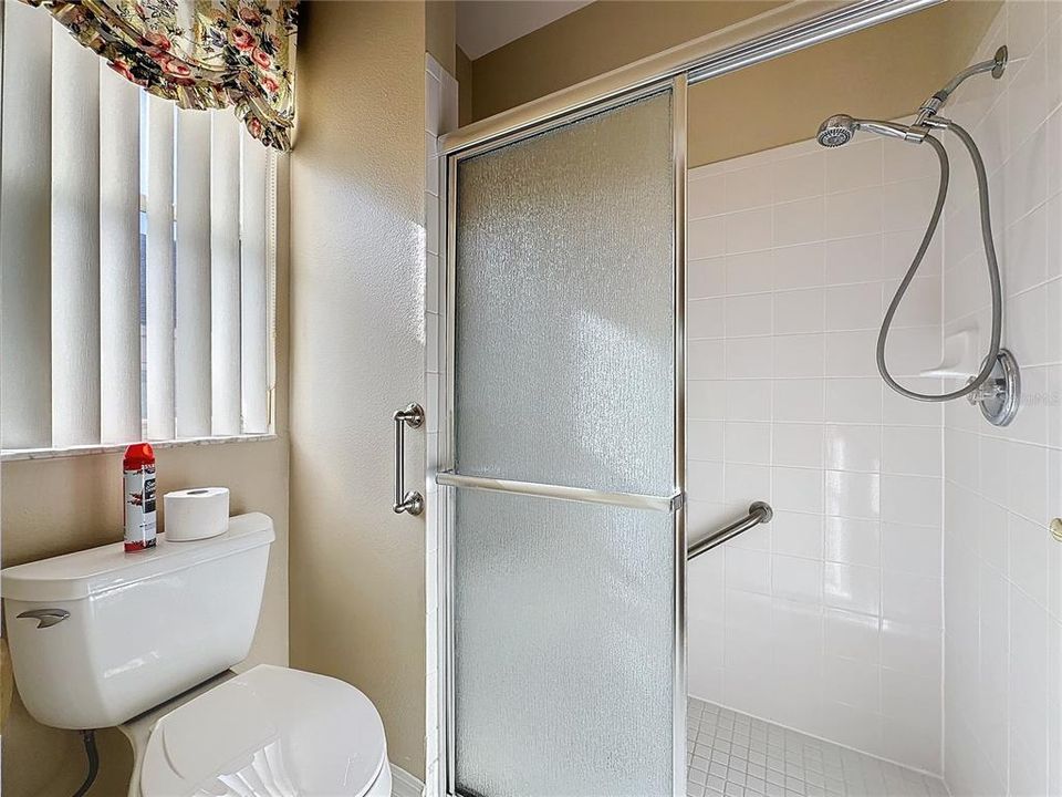 Walk in shower and private toilet area