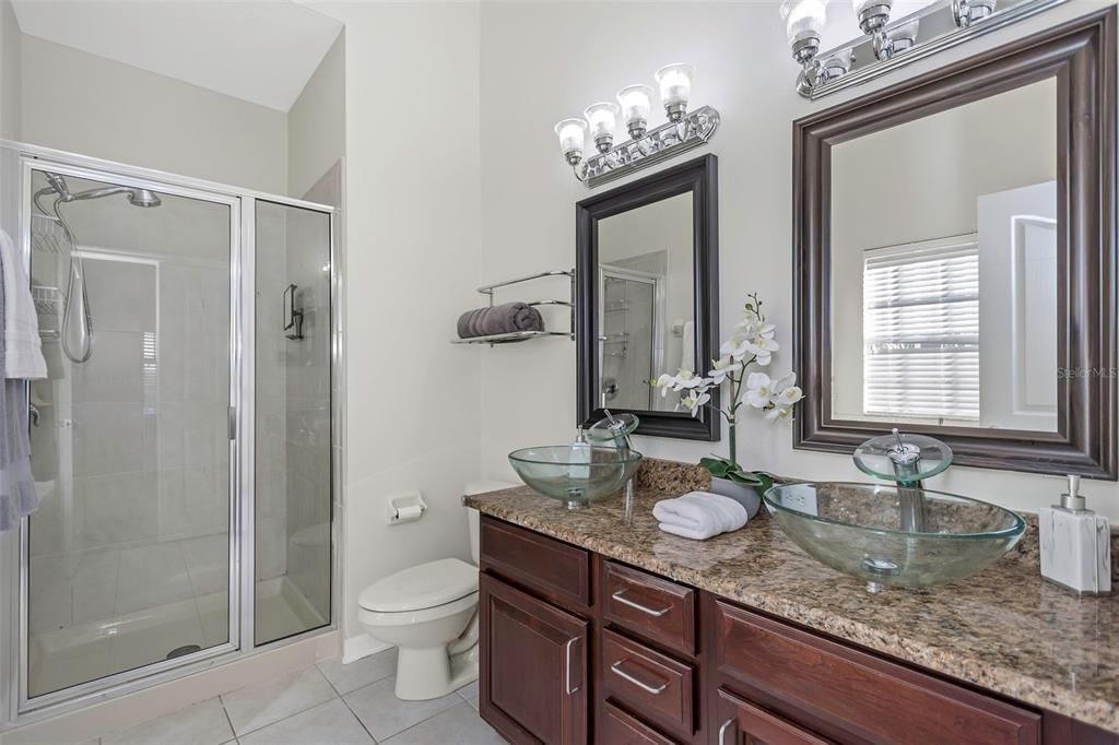 SHOWER STALL AND DUAL SINKS W/JET TUB