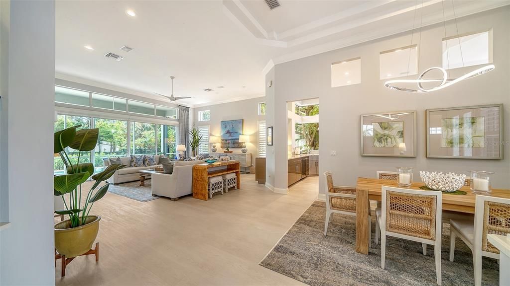 THE OPEN FLOOR PLAN & FORMAL DINING AREA