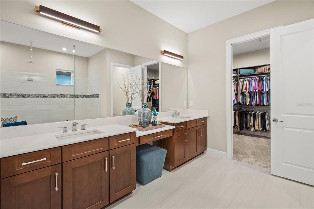 Owner's Suite with Ensuite Bath, and Custom Designed Walk-In Closet