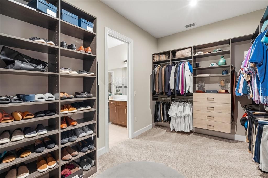 Owner's Suite with Ensuite Bath, and Custom Designed Walk-In Closet