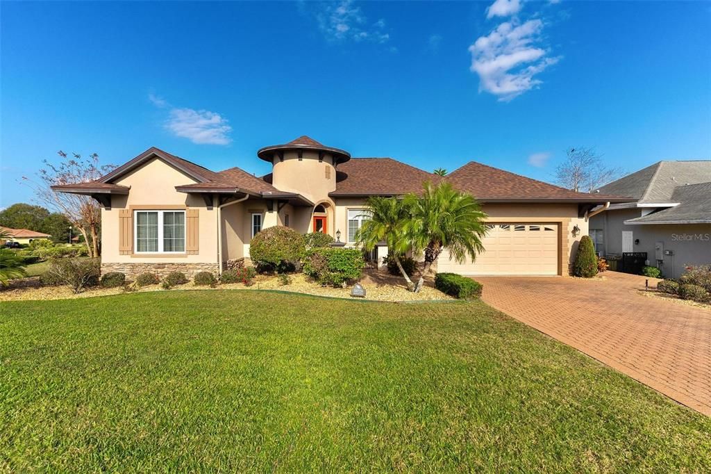 Front view shows professionally landscaped lawn!