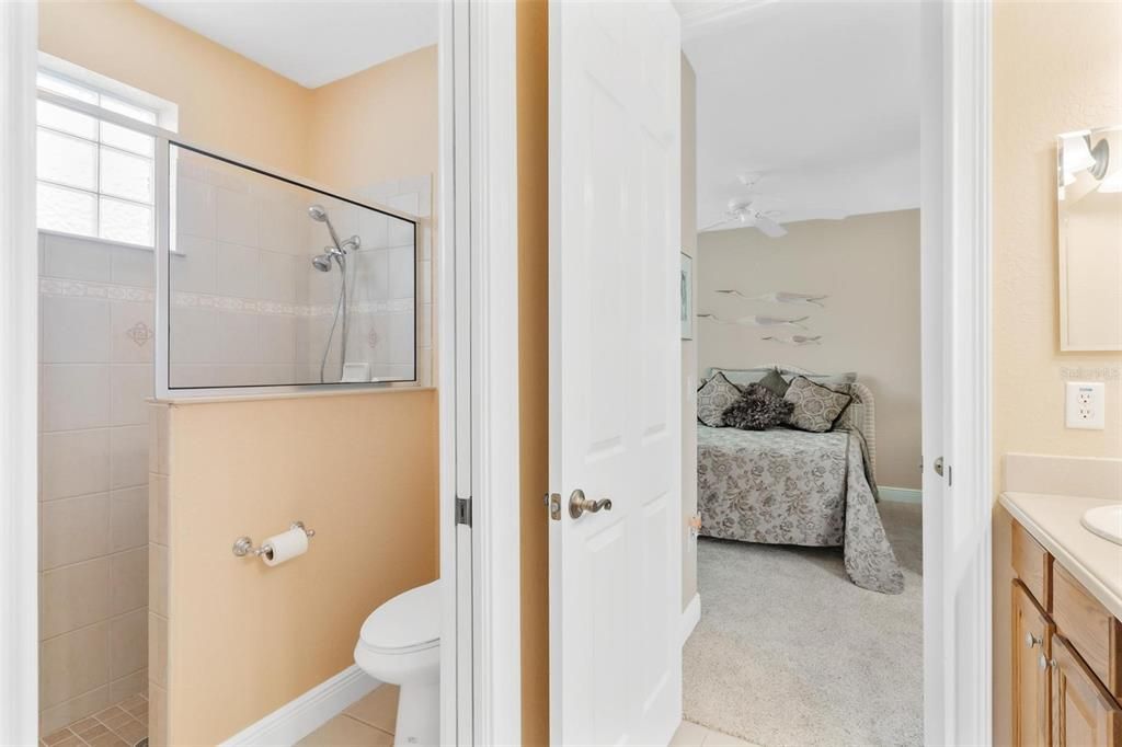 Guest Bath with large Walk in Shower with pocket door to sink area...