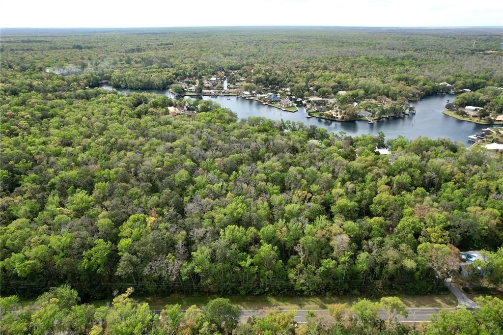 Aerial view of back of property and Halls River Rd