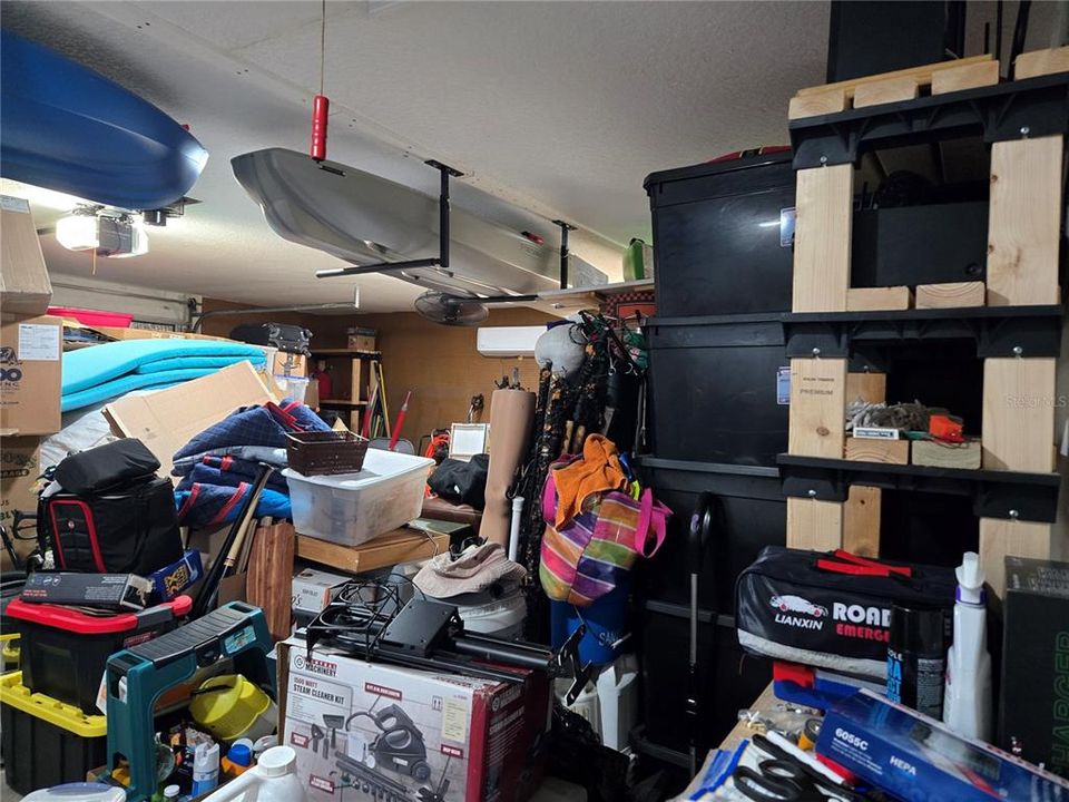 Garage is FINISHED, fully insulated, drywalled, AC mini split, ceiling fans and a NEW garage door opener. Customer is moving so garage is packed, but can still see and move around.